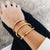 Sahira Jewelry Design Armband Bangle - Goud met balletjes
