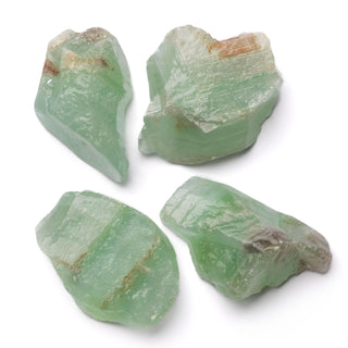 four green calcite stones rough
